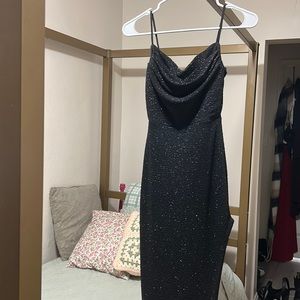 black glittery prom dress with slit